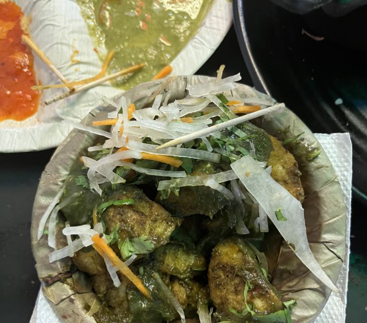 Agra: Sadar Bazar Food Market Night Walking Tour by Tuk-Tuk - Shopping stops and keeping the focus on food