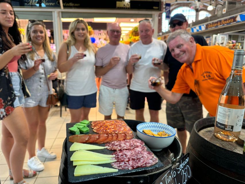 Alicante: Guided Tapas Tour by Bike with Tastings - The promenade and views toward Santa Bárbara Castle