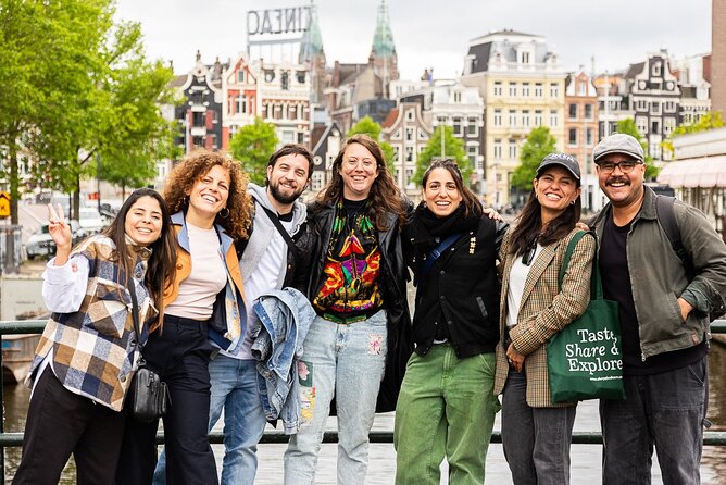 Amsterdam Food Tour: +10 Tastes, Culture and Canals with Sherpa - Rokin adds herring, sausage, and a local beer