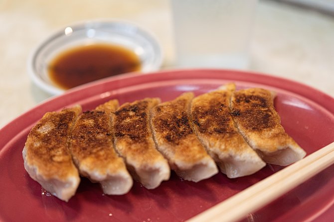 Asakusa Highlights: Street Food Crawl Tour (7+ Local Bites) - Monjayaki brings heat, smoke, and Tokyo character