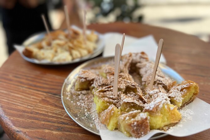 Athens Food Tour with 10+ Tastings of Greek Traditional Dishes - Hadrian’s Library and a short layer of ancient Athens