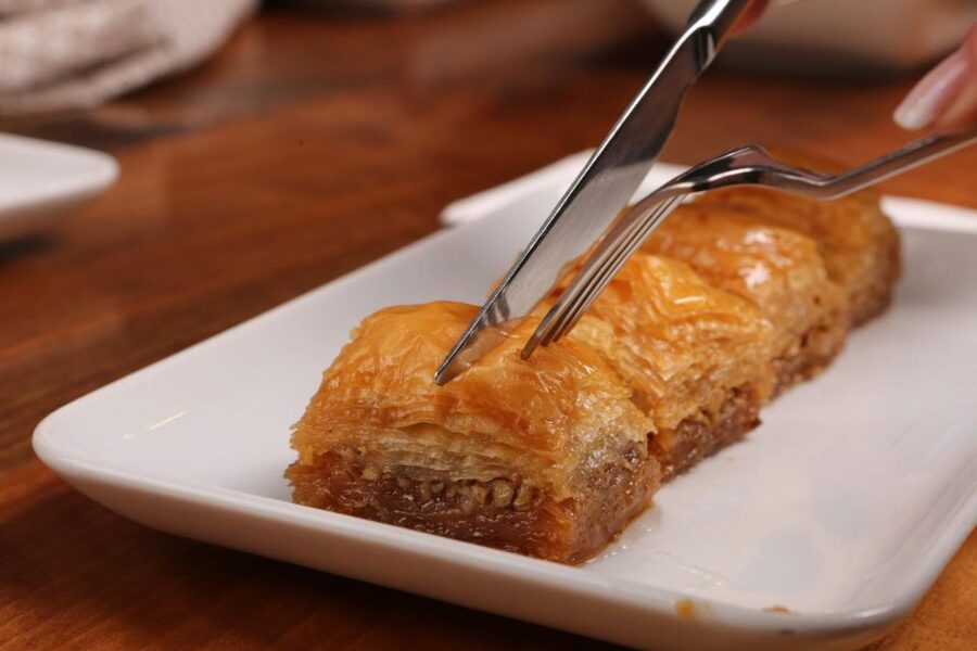 Athens: Street Food Tasting Tour - Sweet stops: loukoumades, bougatsa, and Greek cakes