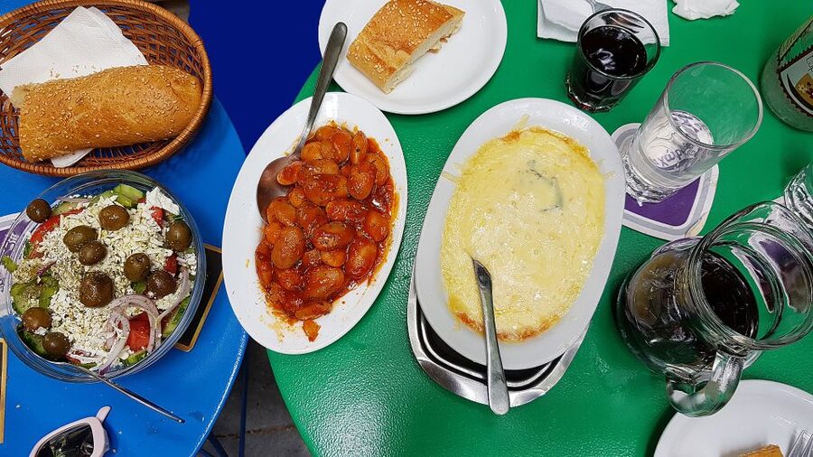 Athens: Traditional Greek food tour in hidden spots - Olive oil, honey, and the taste behind Greek cooking
