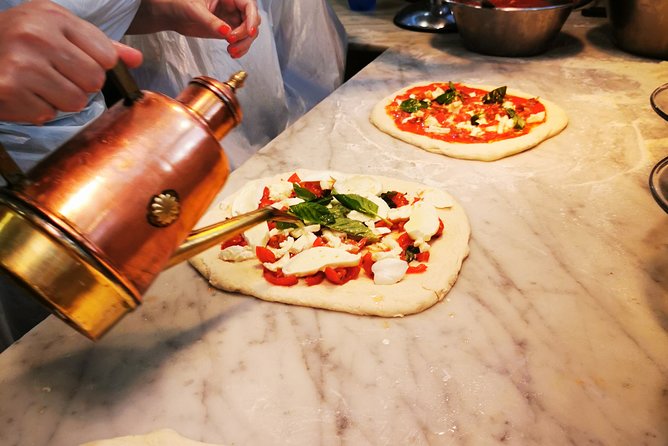 Authentic Pizza Making Class in Naples with Appetizers and Drink - Location, transport, and timing advice