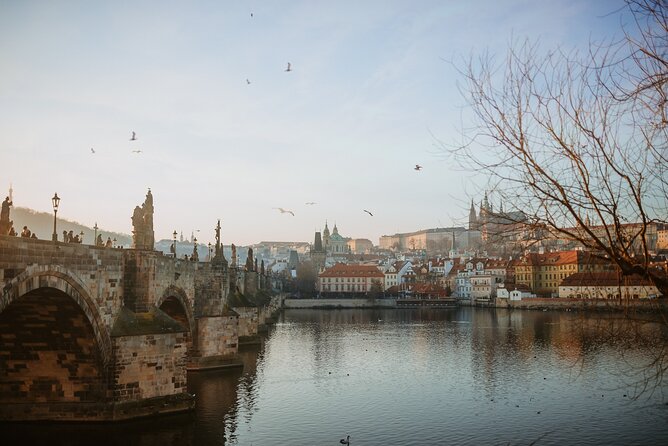 Award-Winning Prague Evening Old Town Food and Drink Tour - Crossing toward Lesser Town
