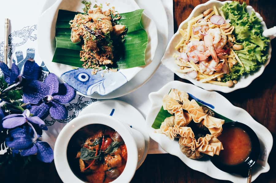 Bangkok: Street Art and Street Food Walking Tour - Charoenkrung Road, murals, and small bites
