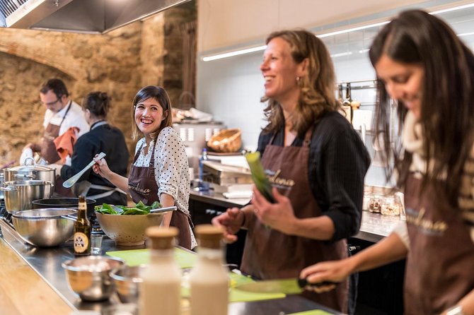 Barcelona Culinary Experience: Paella & Tapas Cooking Class - Paella is the main event