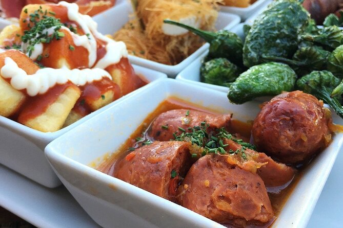 Barcelona Food Tour: Tapas, Drinks and Delights with a Local - Starting with vermouth on Carrer de la Mercè