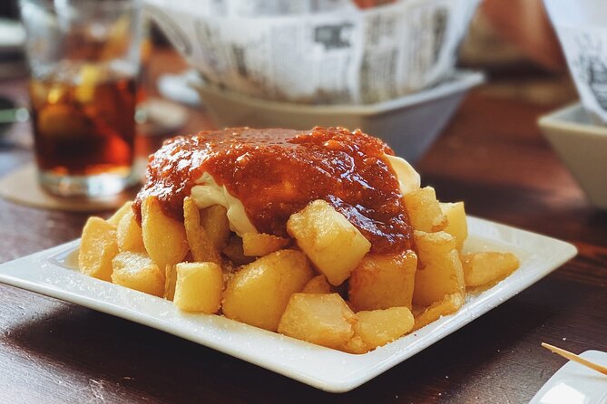 Barcelona Food Tour: Tapas, Drinks and Delights with a Local - Artists and pintxos at Plaça de Sant Josep Oriol