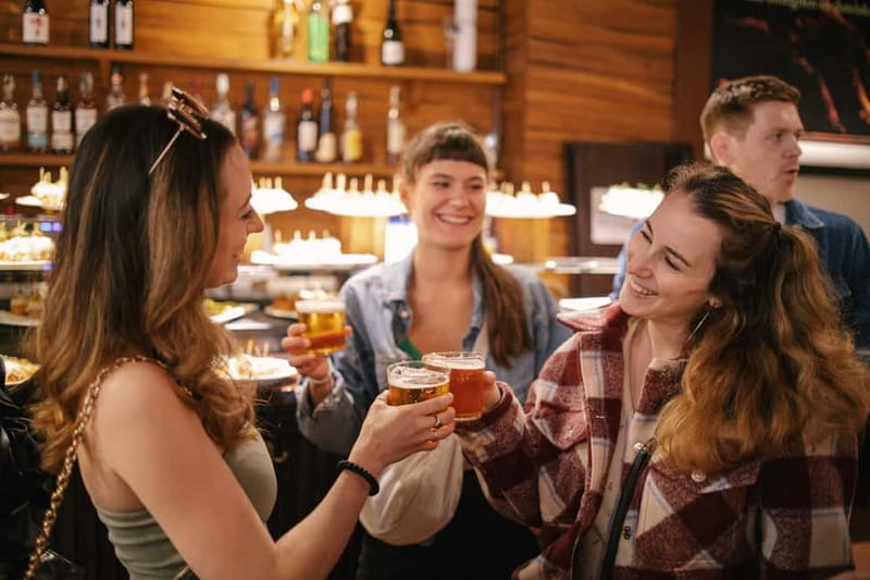 Barcelona: Food Walking Tour with Tapas and Wine - Wine, cava, and vermouth between bites