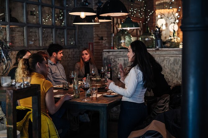 Barcelona: Guided Food Walking Tour with Tapas and Wine - What the $95.53 price really covers