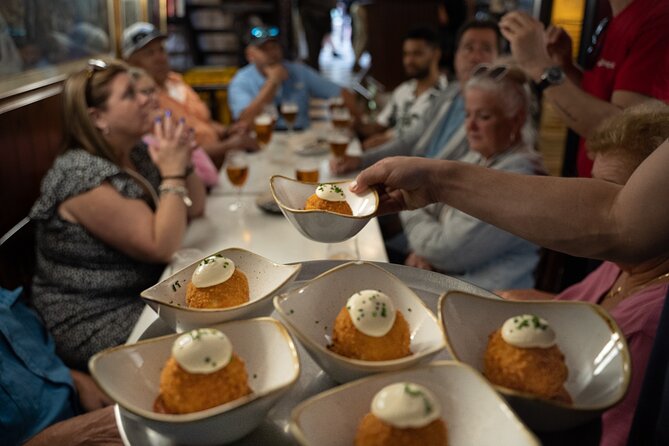 Barcelona Old Town Tapas Tour: Vermouth, Bites & Hidden Gems - City Hall, a sweet bite, and Barcelona’s civic center