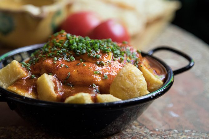 Barcelona Tapas Crawl Tour - Stop one: classic tapas and a local drink