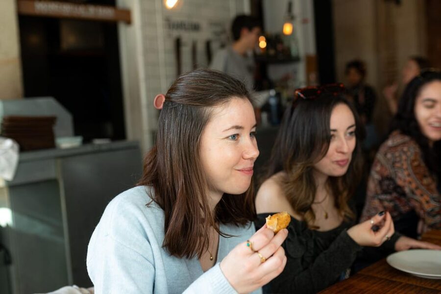 Barcelona: Tapas Tour with Food Tastings and Drinks - Paella, fried fish, and a Catalan dessert