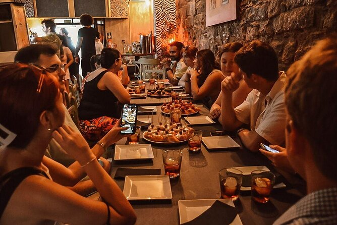 Barcelona Tapas Walking Tour: Food, Wine & History - What the guide adds to the meal