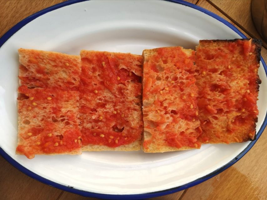 Barcelona: The Ultimate Local Tapas & Drinks Food Tour - The Gothic Quarter between bites