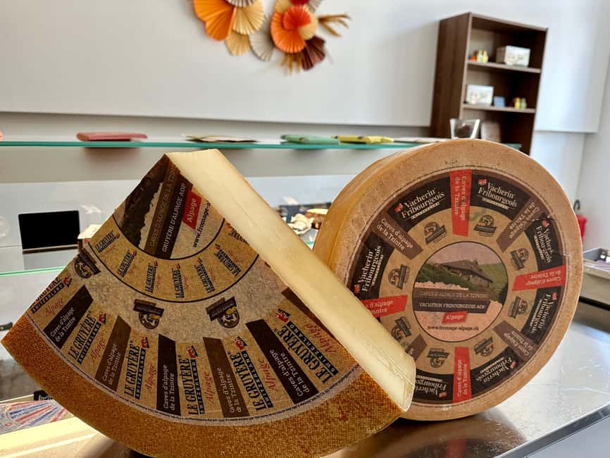 Basel: Local Cheese Tasting Tour with a Cheese Sommelier - A small Basel shop with a serious cheese lesson