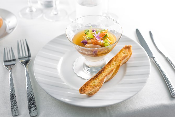 Bateaux Parisiens Seine River Gourmet Lunch & Sightseeing Cruise - Following the Seine past Paris landmarks