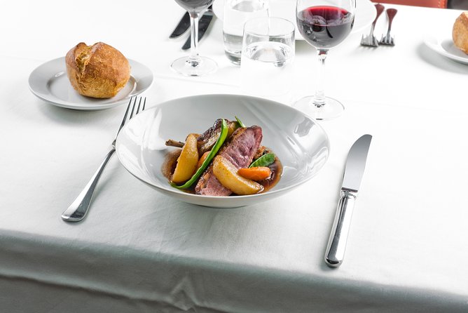 Bateaux Parisiens Seine River Gourmet Lunch & Sightseeing Cruise - Music, service, and the mood aboard