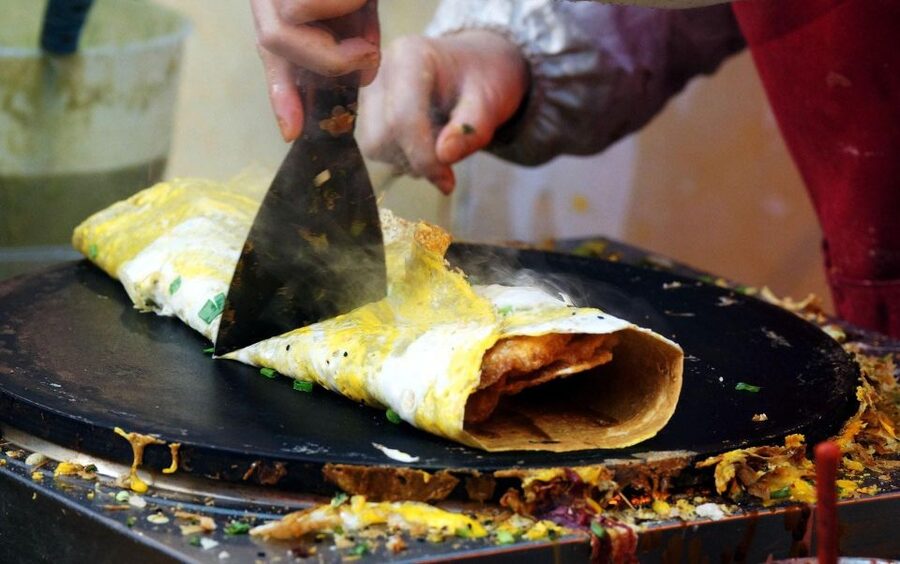 Beijing: Hutong Culinary Walking Tour with 15+ Tastings - Dumplings, pancakes, and noodles with a local guide