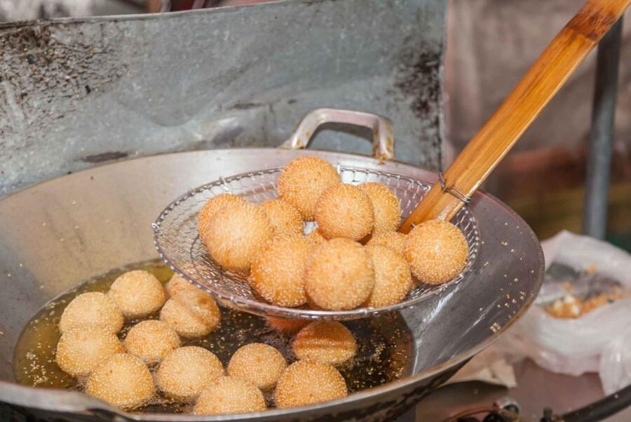 Beijing: Hutong Culinary Walking Tour with 15+ Tastings - Sesame cakes, fried twists, and the first local bites