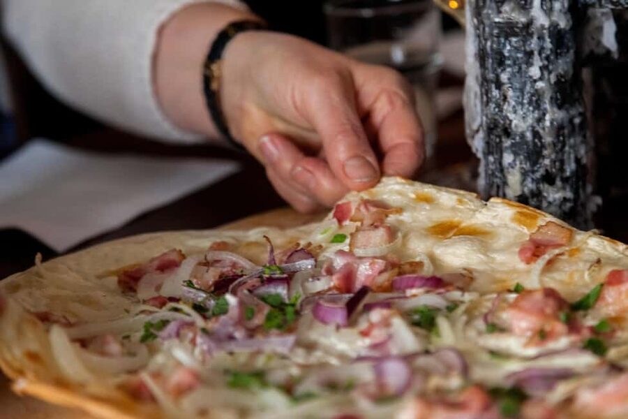 Berlin: Downtown Food Tour with 8 Authentic Local Tastings - Pastries and Berliner doughnuts bring a sweeter turn