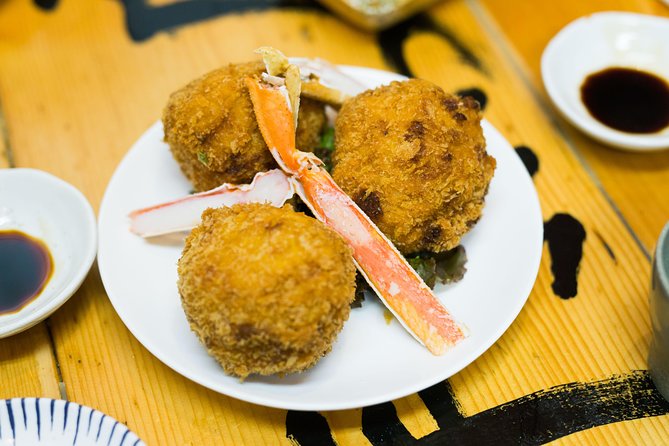 Best of Shinjuku: Izakaya Food Tour (4 Stops, 14+ Tastings) - Walking through Kabukicho and its nightlife