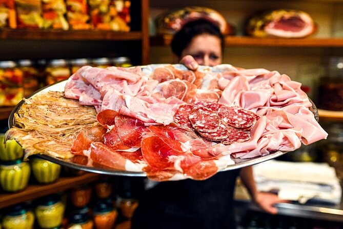 Bologna Food & Market Tour with 6 Tastings, Pasta, Wines & More - Walking the narrow streets of the Quadrilatero