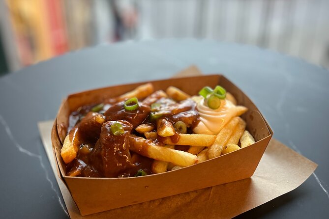 Bruges Food Tour with Full Meal & Drinks by Do Eat Better - Flemish beef stew and Belgian fries by the Belfort