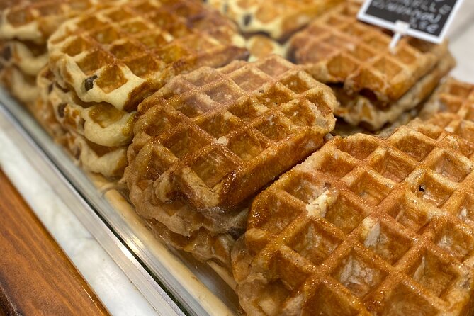 Brussels Food Tour: 10 Tastings of Waffles, Beers, Fries & More - Starting at the Auguste Orts statue
