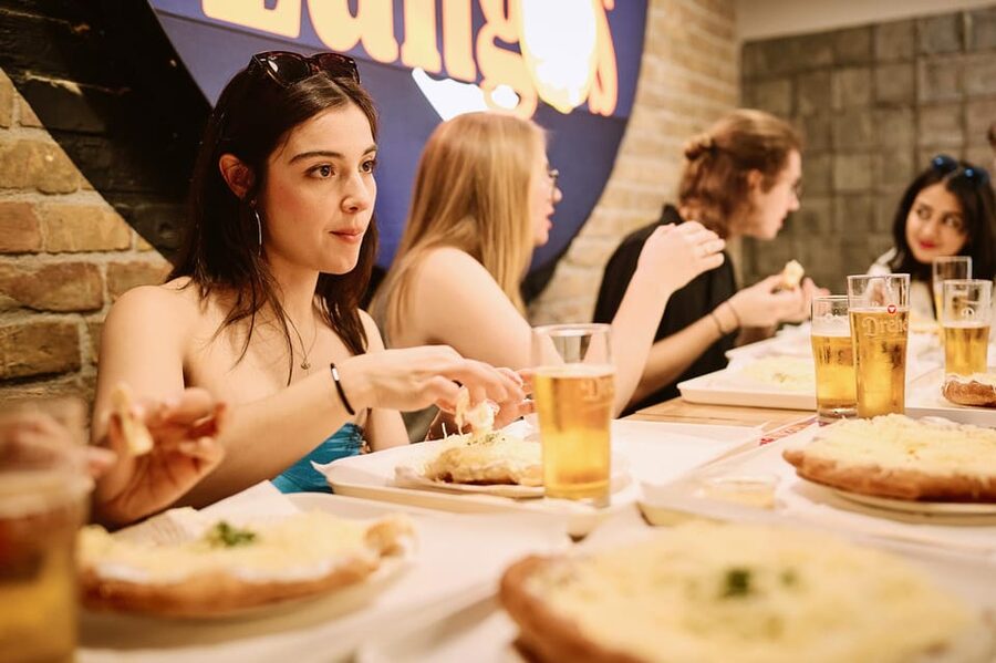 Budapest: Guided Food Tour with Wine, Beer, and Shots - Sit-down Hungarian classics at later stops