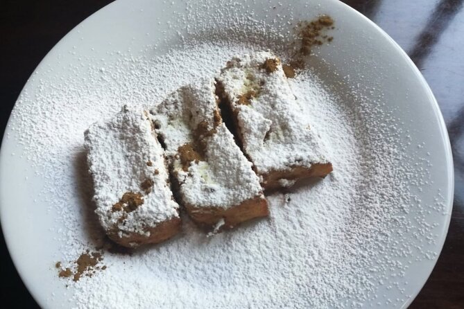 Cadiz Food Tour: Tapas, Drinks and Delights with a Local - Torre Tavira, traditional sweets, and a useful takeaway