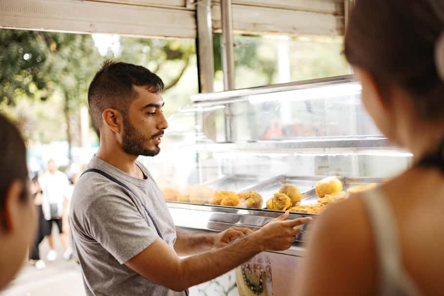 Cali: Street Food Tour - Stop one: Colombian bakery favorites