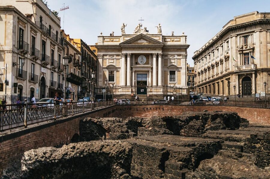 Catania: Guided Street Food Walking Tour - The evening route: wine, bruschette, and the Benedictine monastery