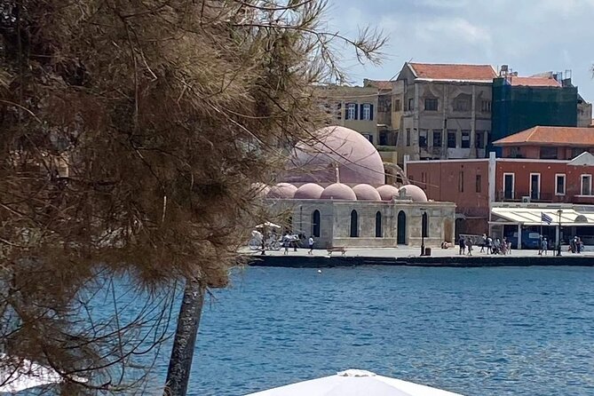 Chania Walking Food And Wine Night Tour - Cheese and wine above the harbor