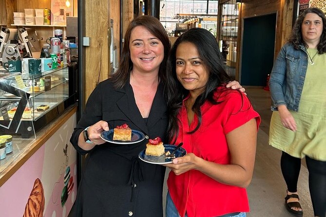 Chester Food Tour: Unique Food With Drinks & Sightseeing - Eastgate Clock and the first tastes of Cheshire