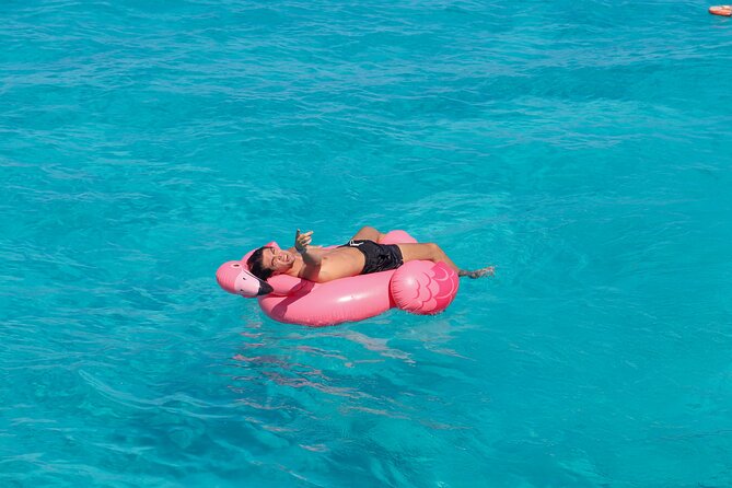 Dancer Cruise Isla Mujeres Snorkel Food and Drinks Included - The Slide, Trampoline, and Swim Stop