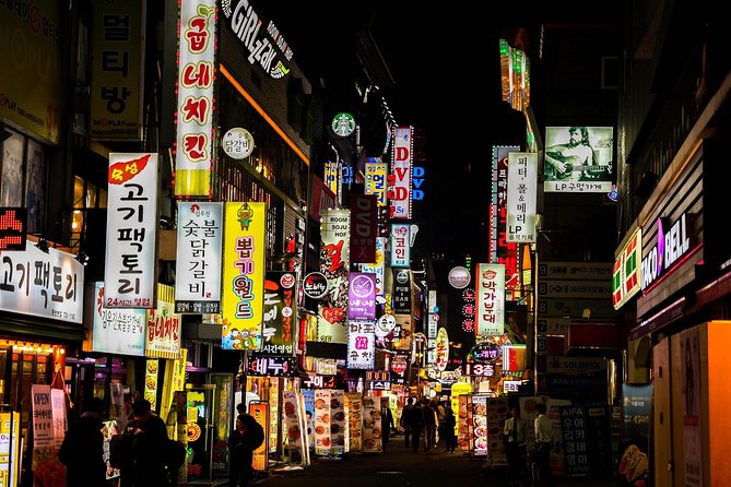 Downtown Seoul Guided Food & Market Tour with 8+ Local Tastings - Sweets, rice cake, and a final cup of tea