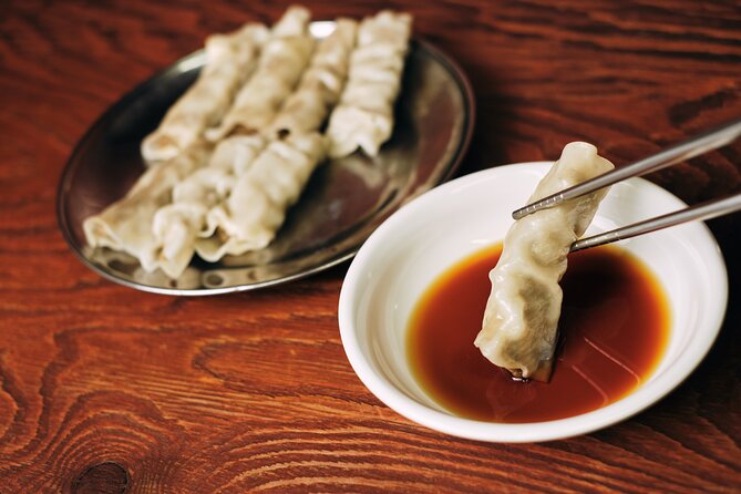 Downtown Seoul Guided Food & Market Tour with 8+ Local Tastings - Mung bean pancakes and the first savory bites