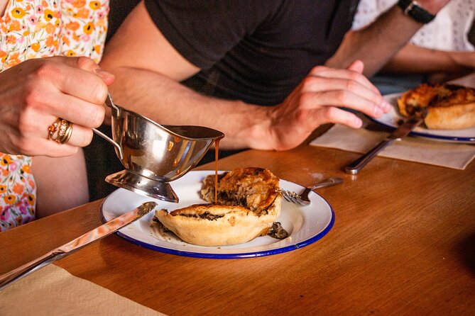 Eating London: Twilight Soho VIP Food & Drinks Tour - Soho after dark, with a plate in hand