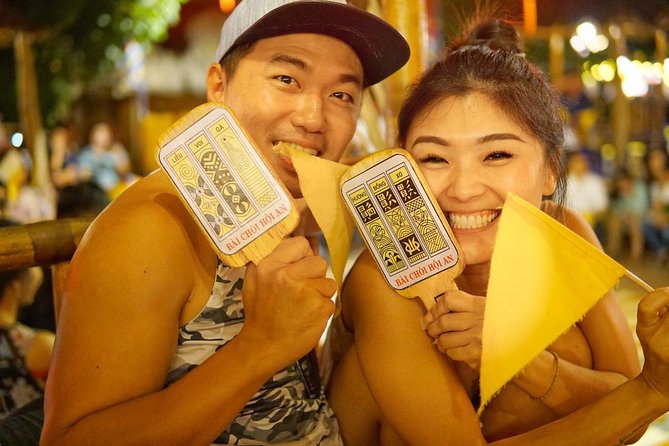 Evening Walking Food Tour, folk game and lantern boat - Folk bingo and the dap nieu pot-breaking game