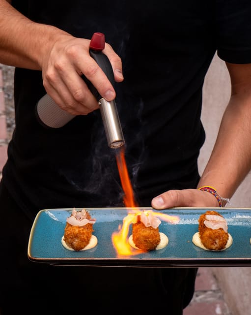 Explore Marbella Old Town: Authentic Tapas Food Tour - First tapas stop: a full meal begins