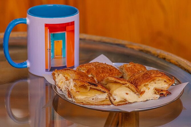 Feast on Athens: LGBTQ+ Walking Food Tour - Psiri begins with koulouri and bougatsa