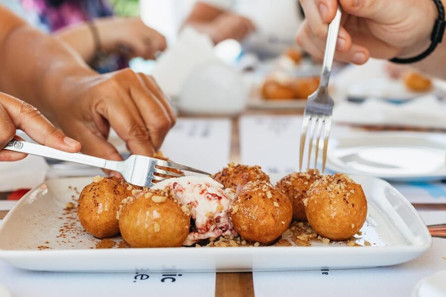 Fira: Guided Foodie Walking Tour with Tastings - Mezes in a traditional Santorini tavern