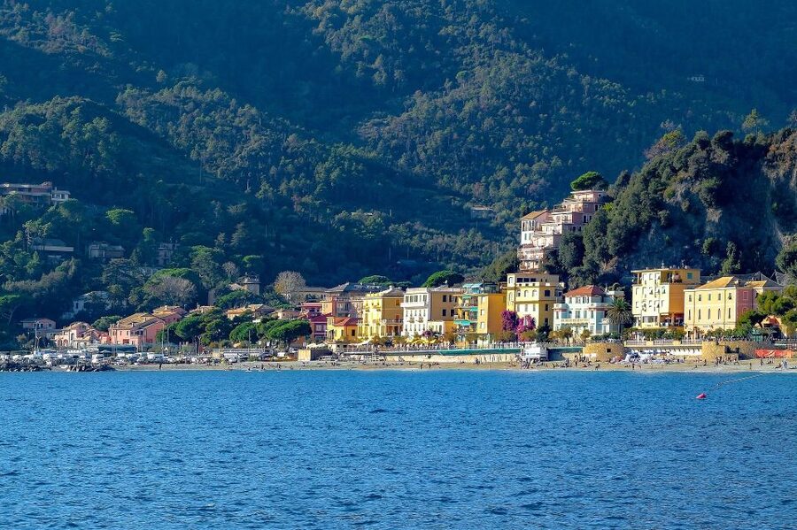 Florence: Cinque Terre Day Trip with Optional Street Food - Riomaggiore: colorful streets and a short stop