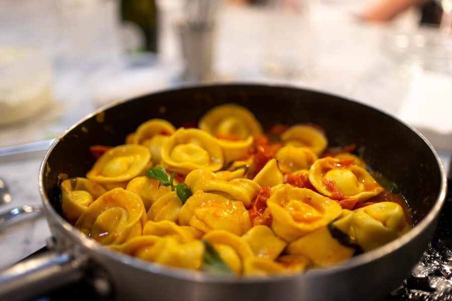 Florence: Cooking Class with Local Food Market Tour - Cooking pasta by hand, not watching a stage show