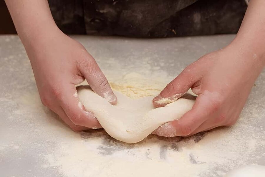 Florence: Private Pizza Making Class with Wine Tasting - Rolling, saucing, and shaping your own pizza