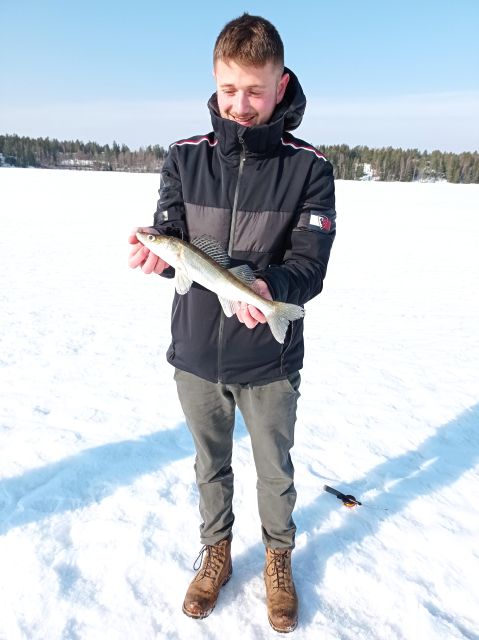 From Helsinki: Bodom Lake Ice Fishing with Food & Drinks - The laavu fire and Finnish comfort food