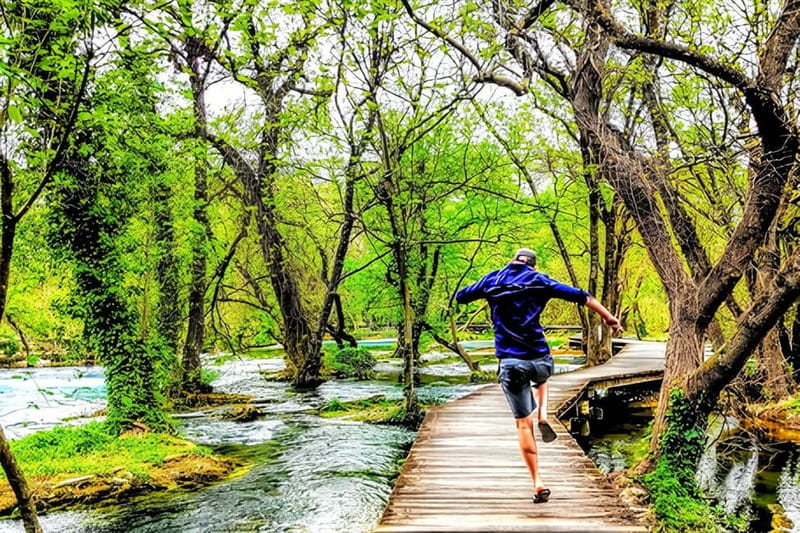 From Split: Krka Waterfalls with Wine & Cheese Tasting Tour - Walking into Krka National Park