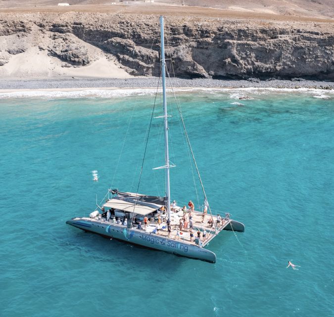 Fuerteventura: Magic Catamaran Trip with Food and Drinks - Lunch, wine, beer, and a relaxed hour onboard